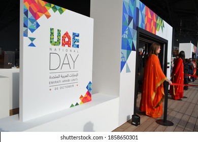 Milan, Italy - October 20, 2015: Close-up View Of The Conference Hall Entrance During UAE Day At EXPO Milan 2015 With Women Receptionists Standing.