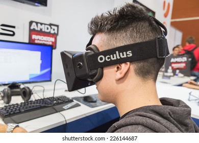 MILAN, ITALY - OCTOBER 24: Guy tries Oculus headset at Games Week 2014, event dedicated to video games and electronic entertainment on OCTOBER 24, 2014 in Milan.
