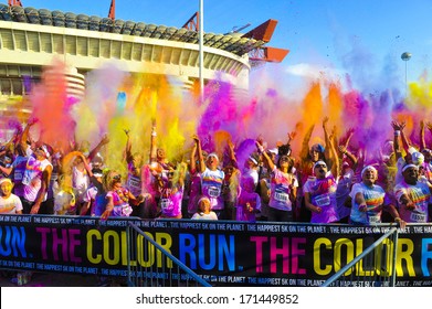 MILAN, ITALY - SEPTEMBER 09: thousands of people gathering to partecipate at the first  Color Run outside the San Siro stadium in Milan, September, 09 2013. 