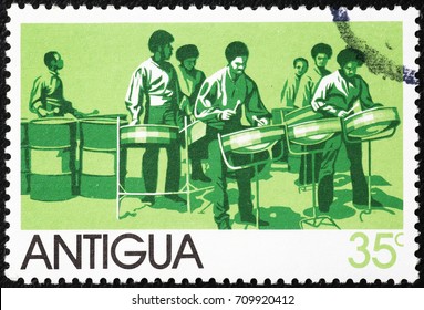 Milan, Italy - September 1, 2017: Steel Drum Band On Antiguan Postage Stamp