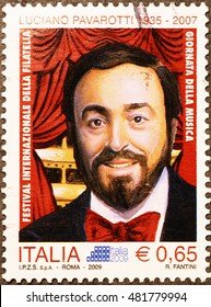 Milan, Italy - September 11, 2016: Luciano Pavarotti On Italian Postage Stamp