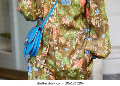 MILAN, ITALY - SEPTEMBER 18, 2019: Woman with floral shirt and trousers, street style 