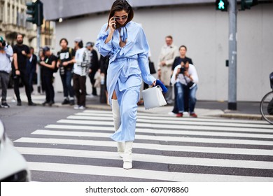 MILAN, ITALY - SEPTEMBER 22, Woman leaves Max Mara fashion show, Milan Fashion Week Spring/Summer 2017