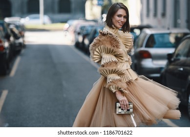 Milan, Italy - September 23, 2018: Street style outfits before Dolce Gabbana fashion show during Milan Fashion Week - - MFWSS19