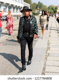 Milan, Italy - September 23, 2018: Street style outfits during Milan Fashion Week - - MFWSS19 - Shutterstock ID 1217784808