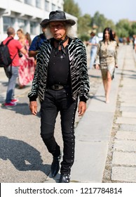 Milan, Italy - September 23, 2018: Street style outfits during Milan Fashion Week - - MFWSS19 - Shutterstock ID 1217784814