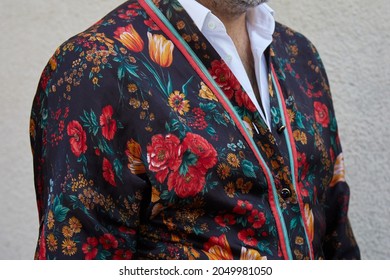 MILAN, ITALY - SEPTEMBER 24, 2021: Man with jacket with floral design, street style