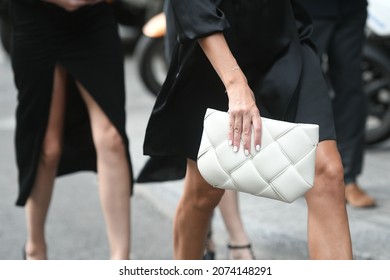 Milan, Italy - September 24, 2021:  Street style outfit, group of fashionable women on the streets of Milan, Italy. - Shutterstock ID 2074148291