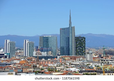 Milan , Italy September 24,2018 Duomo, Vittorio Emanuele Gallery And Skyline - Skyscrapers And Downtown - Unicredit Tower With Mountains Behind - Aerial View