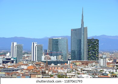 Milan , Italy September 24,2018 Duomo, Vittorio Emanuele Gallery And Skyline - Skyscrapers And Downtown - Unicredit Tower With Mountains Behind - Aerial View