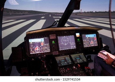 Milan, Italy - September 27 2019: Full Flight Simulators Are Essential For Modern Crew Training. In The Picture A Modern Cockpit With  Blurred Scenario In The Background.