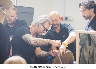 MILAN, ITALY - SEPTEMBER 28: People During Milan Fashion Week, Italy On SEPTEMBER 28, 2015. Armani Fashion Show Backstage With Makeup Artist And Hair Stylist