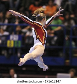 MILAN, ITALY-APRIL 02, 2009: A Female Gymnast Playing Floor Exercise, During The European Artistic Gymnastic Championship, In Milan.