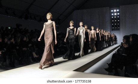 MILAN, ITALY-FEBRUARY 26, 2010: Models on runway catwalk during the spring-summer fashion collection of italian stylist Alberta Ferretti.