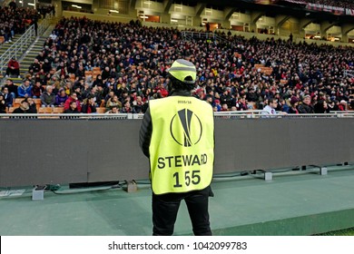 MILAN, ITALY-MARCH 08, 2018: Security Steward Staff At The San Siro Soccer Stadium At Night, During The UEFA League Match AC Milan Vs Arsenal, In Milan. 