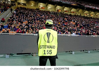 MILAN, ITALY-MARCH 08, 2018: Security Steward Staff At The San Siro Soccer Stadium At Night, During The UEFA League Match AC Milan Vs Arsenal, In Milan. 