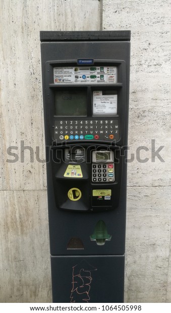 Milan, Italy-March 2018: car park machine in the\
street for fee payment