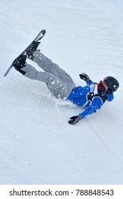 MILAN, ITALY-NOVEMBER 11, 2017: Professional Free Style Snowboarder Fall During The Big Air Competition Of The Snowboard World Cup, In Milan.