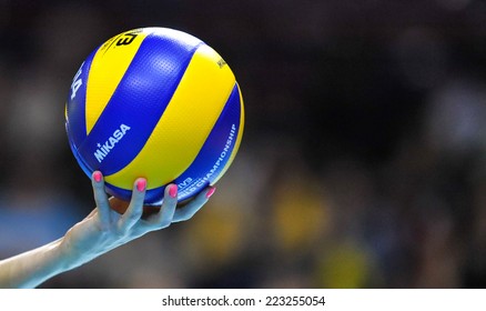 MILAN, ITALY-OCTOBER 10, 2014: Brazil player's hands close up holding the ball, during the indoor female volleyball match Brazil vs Dominican Republic of the Volleyball World Cup, in Milan.
