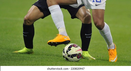 MILAN, ITALY-SEPTEMBER 24,2014: soccer players close up in action, during the serie A match FC Internazionale vs Atalanta at the San Siro stadium, in Milan. 