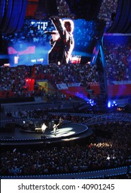 MILAN -  JULY 8: U2 Rock Band Perform During The U2 360° Tour Concert On 8 July, 2009 In Milan, Italy.