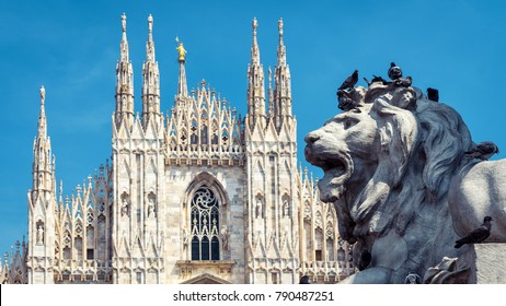 Milan Landmarks, Italy, Europe. Panorama Of Lion Statue And Milan Cathedral, Largest Church In Italy. Scenery Of Old Italian Architecture Of Milano City. Concept Of Tourism And Travel In Italy.