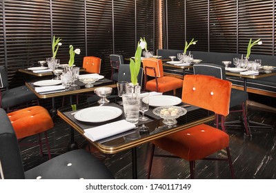 Milan, Lombardy, Italy : February 5, 2015 :Upmarket 50s Restaurant Interior With Red Accents And Black Decor