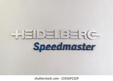 Milan, Lombardy, Italy - July 8, 2022 : Heidelberg Speedmaster Inscription On Gray Surface Of Industrial Offset Printer In Typography Workshop