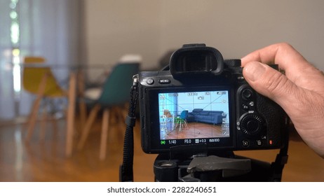 Milan -  Photographer real estate - videos and photos of interiors of houses for sale - home staging in the kitchen and living room blue wall - professional photographic  shooting  indoor at home  - Shutterstock ID 2282240651