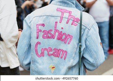 MILAN - SEPTEMBER 22: Woman With Jeans Jacket With The Fashion Cream Writing Before Fendi Fashion Show, Milan Fashion Week Street Style On September 22, 2016 In Milan.