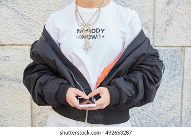 MILAN - SEPTEMBER 22: Woman With Nobody Knows White T Shirt Before Cristiano Burani Fashion Show, Milan Fashion Week Street Style On September 22, 2016 In Milan.