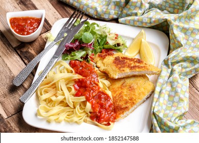 milanese escalope with pasta and tomato sauce