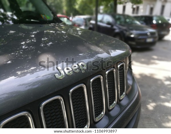 Milan,Italy-June 2018: Jeep Car Manufacturer Sign on\
Grey Car Hood