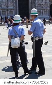 Milano, Italy - 05.18.2017: Two Italian Police Officers Talking On The  Dome Square.