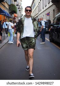 MILANO, Italy: 15 June 2019: Fashion blogger street style outfit after Versace fashion show during Milano Fashion Week man 2019/2020