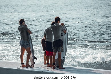 MIlano, Italy, 20 June, 2019 / Group Of Young Surfers With Surf Boards Waiting For Their Turn In The Wave Pool. Idroscalo Lake.