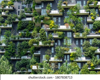 Milano, Italy. August 21, 2020. Bosco Verticale, a close up view at the modern and ecological skyscrapers with many trees on each balcony. Modern architecture, vertical gardens, terraces with plants