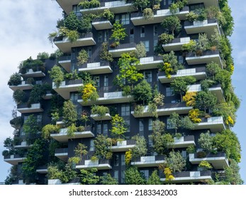 Milano, Italy. July 25, 2022. Bosco Verticale, a close up view at the modern and ecological skyscrapers with many trees on each balcony. Modern architecture, vertical gardens, terraces with plants