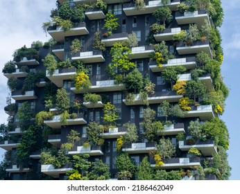 Milano, Italy. July 25, 2022. Bosco Verticale, a close up view at the modern and ecological skyscrapers with many trees on each balcony. Modern architecture, vertical gardens, terraces with plants