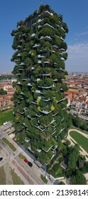 Milano, Italy - July 29, 2021: Aerial view of famous architectural complex Bosco Verticale in Milan Italy. Modern architecture, vertical gardens. Vertical forest in Milan drone view.