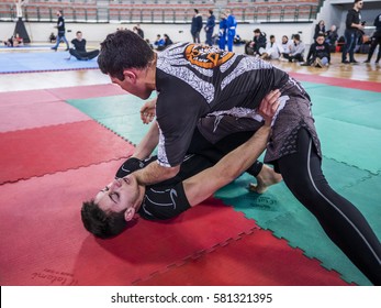 MILAZZO, ITALY - FEBRUARY 12. Knee on Belly during BJJ & Grappling Competition, Brazilian Jiu Jitsu Tournament, Tirreno Challenge on February 12, 2017.