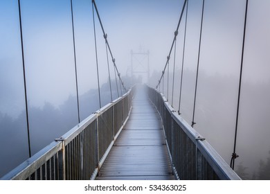 The Mile High Swinging Bridge in fog, at Grandfather Mountain, North Carolina.