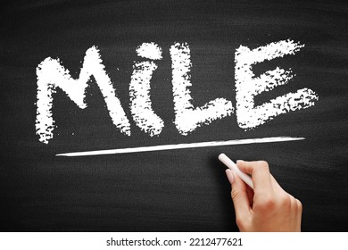 MILE - Maximum Impact Little Effort Acronym, Business Concept On Blackboard