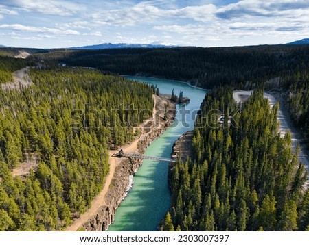 Miles Canyon, Yukon, Canada, is a breathtaking natural wonder. It is home to the majestic Yukon River and the iconic Robert Lowe Suspension Bridge