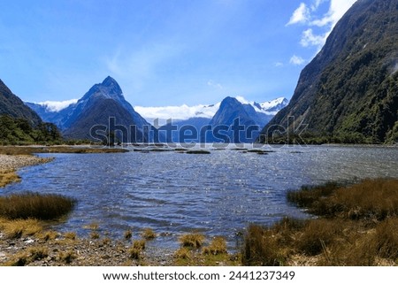 milfordsound by the lake with blue sky in fine day in summer