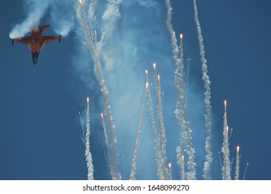 Military Aircraft Shooting Out Flares.