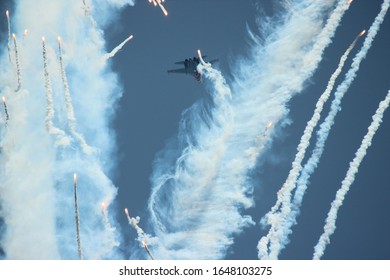 Military Aircraft Shooting Out Flares.