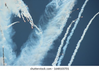 Military Aircraft Shooting Out Flares.