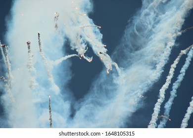 Military Aircraft Shooting Out Flares.