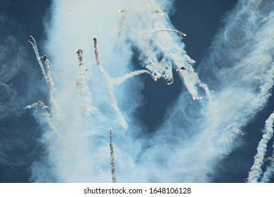 Military Aircraft Shooting Out Flares.